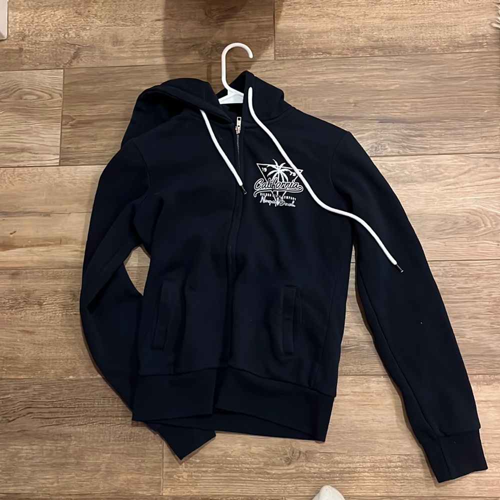 woman’s navy blue california jacket